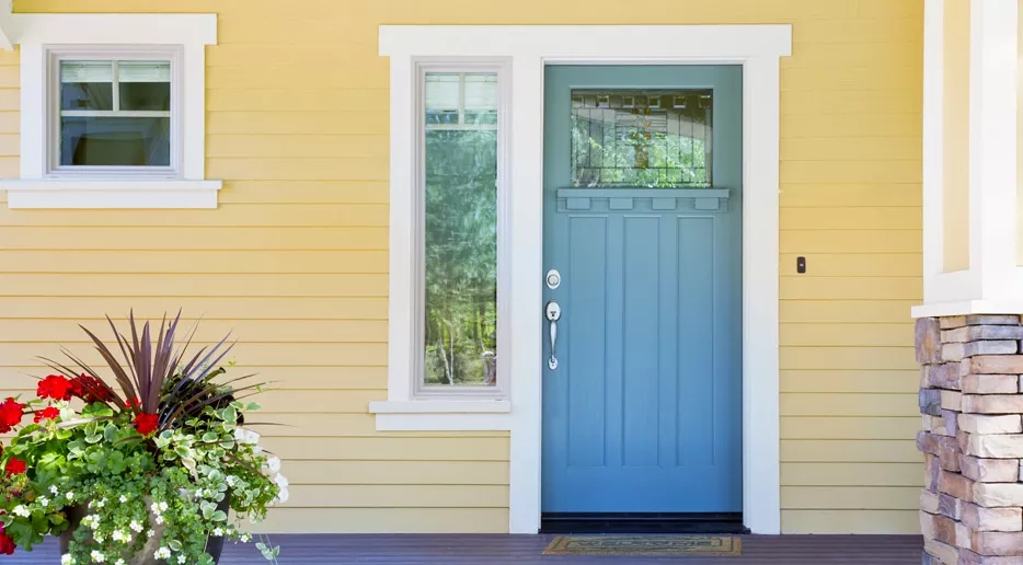blue door yellow house