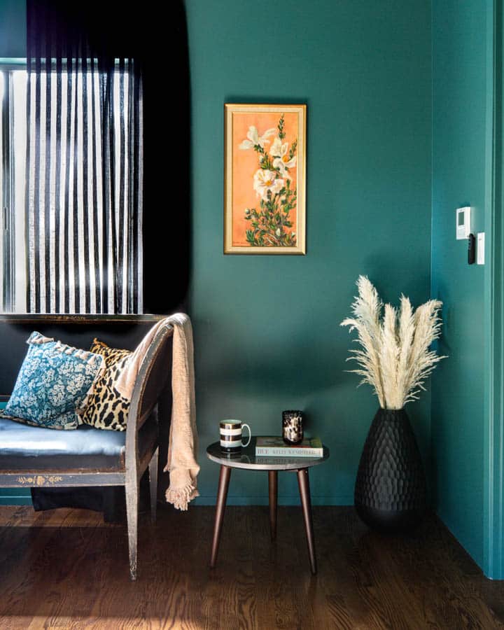 A living room with blue walls