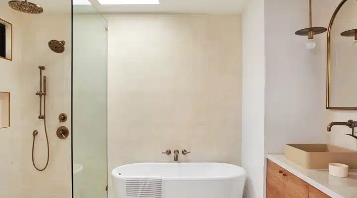 A room with a sink and a shower