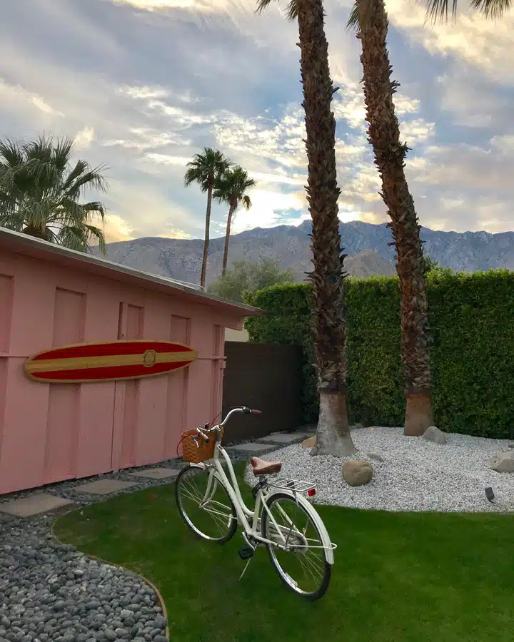 A bicycle parked in front of a house