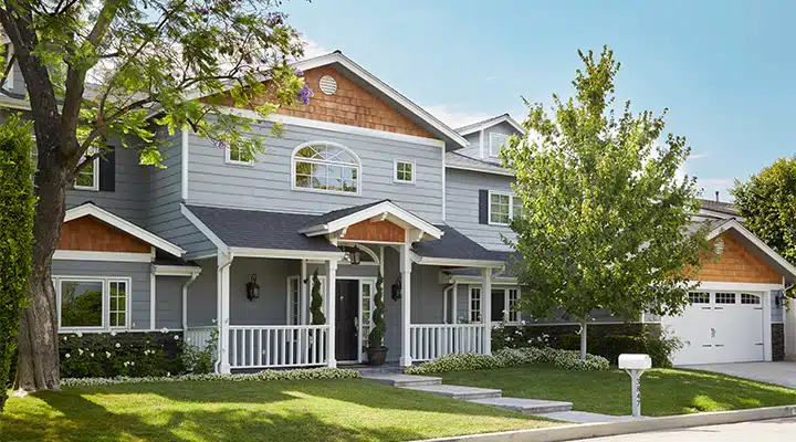 A large lawn in front of a house