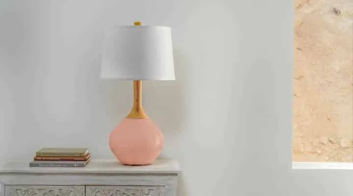 A lamp that is sitting on a table