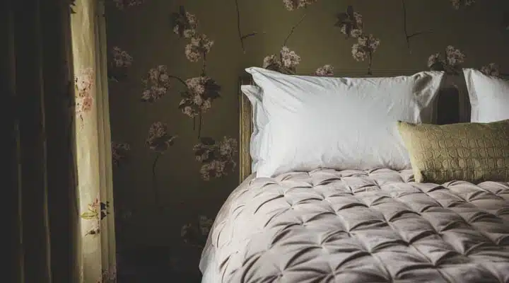 A made bed in a room