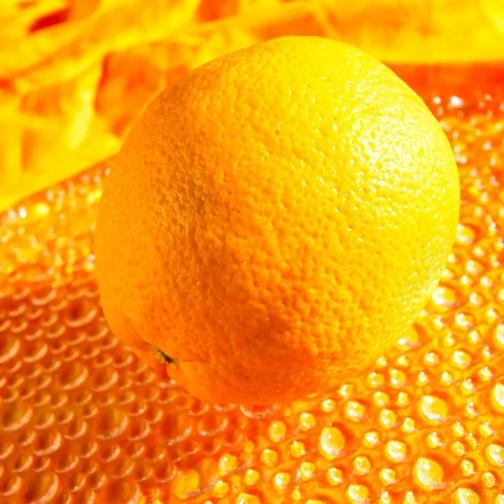 A close up of a group of oranges